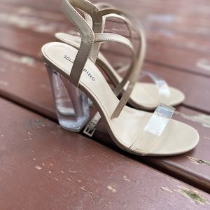 Tan Call it spring high heal shoes with clear heal